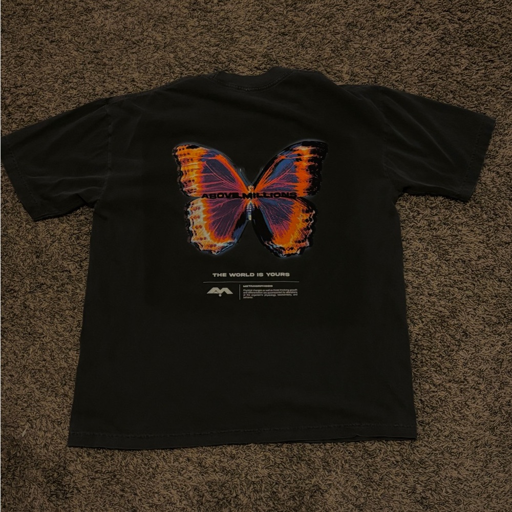 Above Millions Butterfly Tee